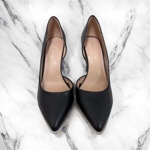 BCBGeneration Black Leather stiletto pump w/ silver chain detail. NWT, W8.5